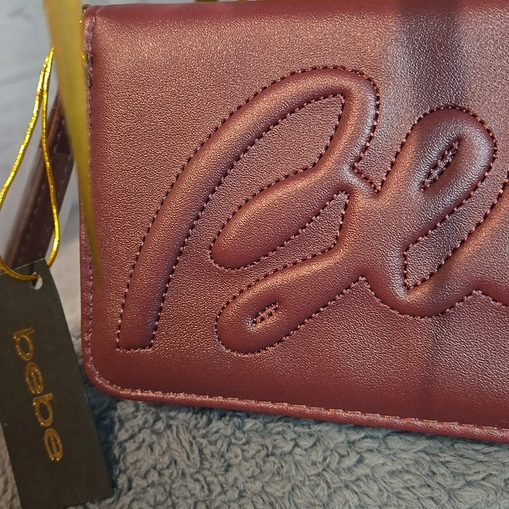 Bebe Quilted Signature Wallet Clutch in Plum